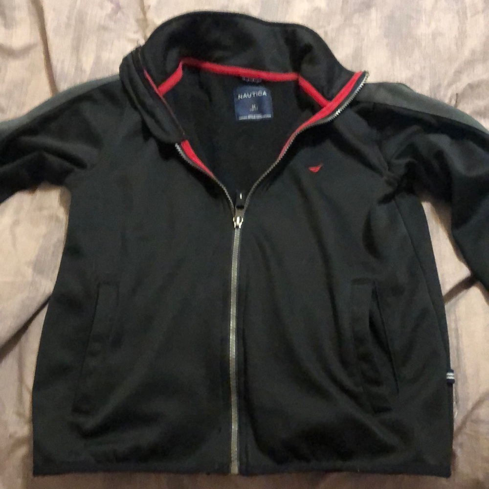 Boys Nautica brand fleece. ZIP front. Size 10/12. Black with gray sleeve strip.